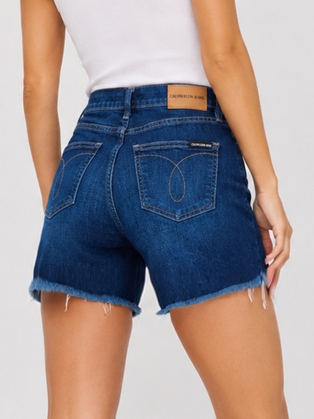 Calvin Klein High Rise Raw Hem Denim Shorts - Picture 2 of 9